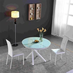 Круглий розсувний обідній стіл